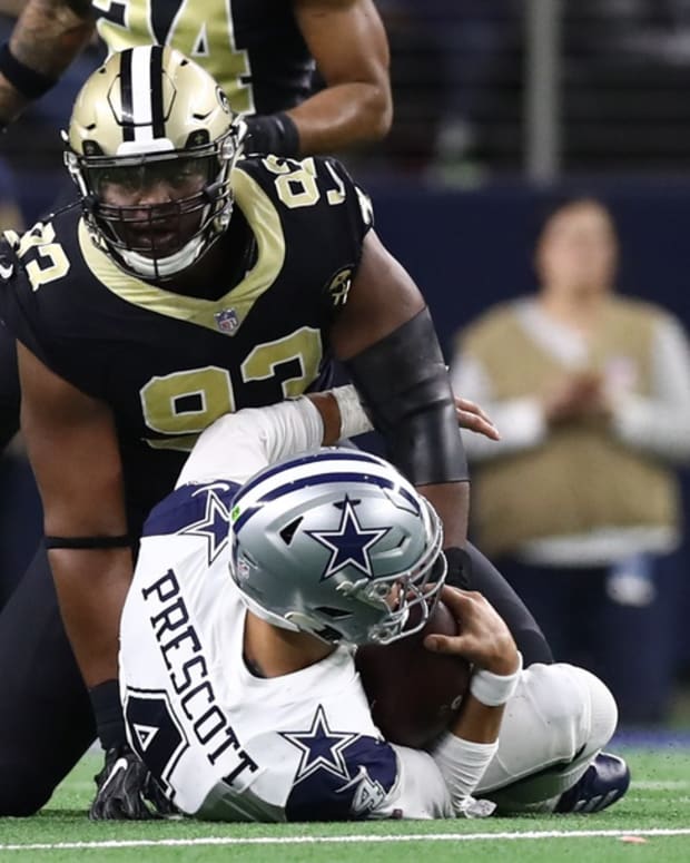 Onyemata Sacks Prescott